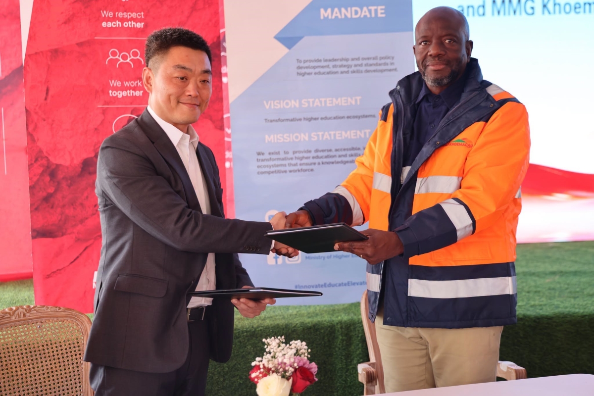 Permanent Secretary, Ministry of Higher Education Prof. Richard Tabulawa (R) and The acting President - Africa Operations and Director- Finance, MMG, Khoemacau, Mr Wei Gao (L) after signing the MOU.  